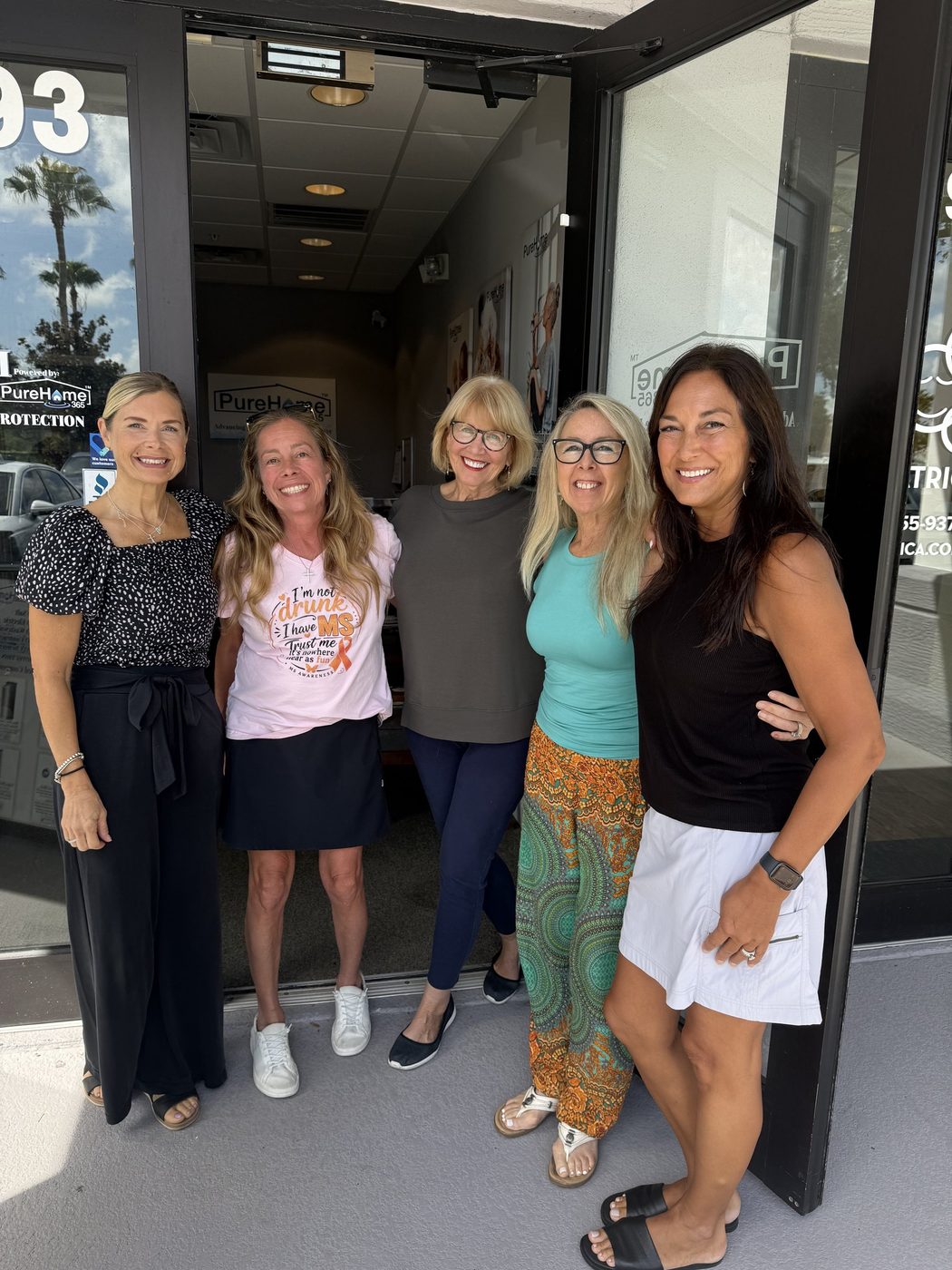 The PureHome365 team outside their Lakewood Ranch office
