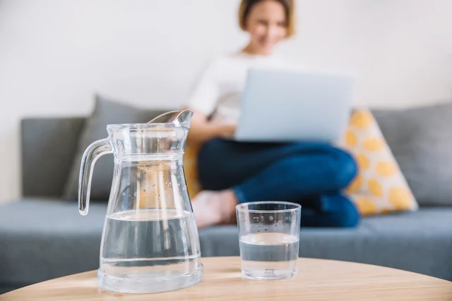 Fresh water in a glass and pitcher